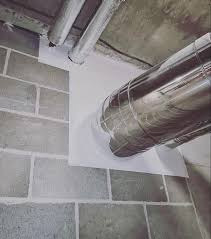 Installers applying fire stopping systems